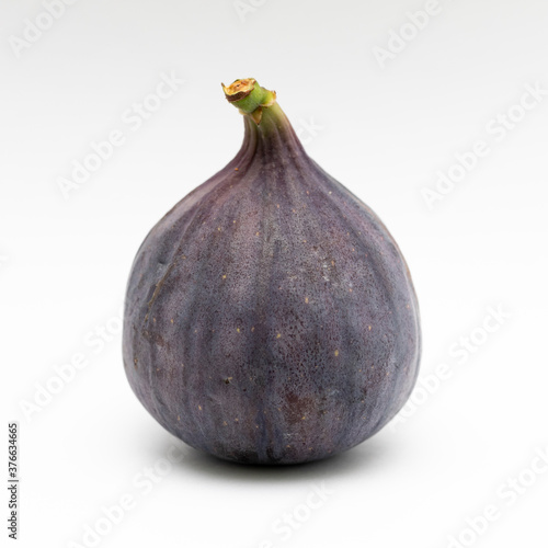Purple figs on a white background close-up.