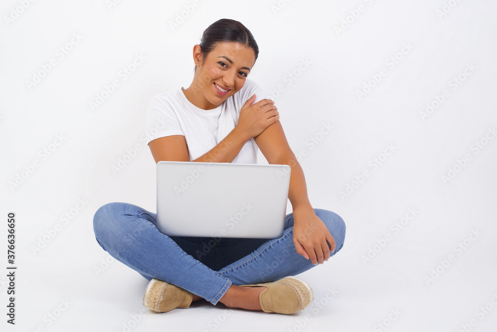 People, lifestyle, youth and happiness concept. Shy pretty girl feeling happy after boy who she likes invited her out on date. People, lifestyle, youth and happiness concept. Shy pretty girl feeling happy after boy who she likes invited her out on date.