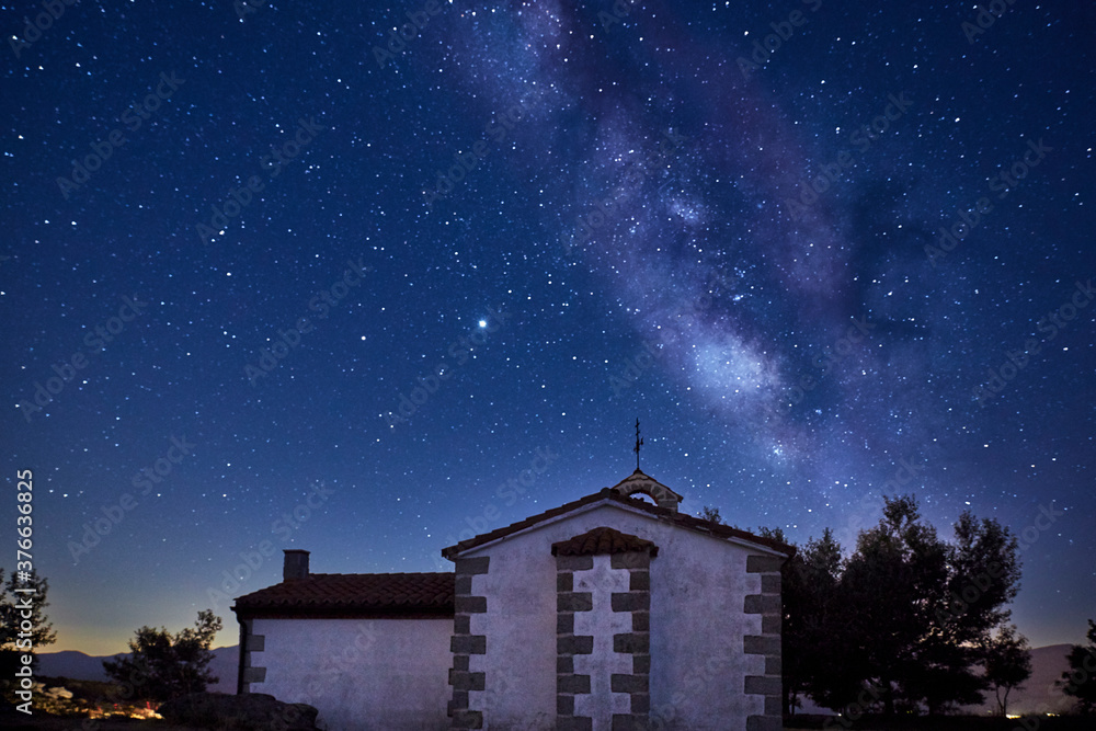 View of the Milky Way over a small chapel. Concept science View of the Milky Way over a small chapel. Concept science
