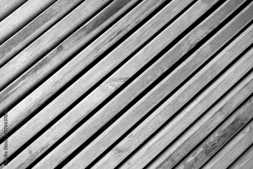 Weathered wooden planks texture with gaps. black and white Weathered wooden planks texture with gaps. black and white