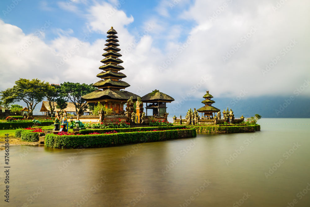 Pura Ulun Danu Bratan temple. Balinese landmark. Water reflection. Slow shutter speed. Bratan lake, Bali, Indonesia Pura Ulun Danu Bratan temple. Balinese landmark. Water reflection. Slow shutter speed. Bratan lake, Bali, Indonesia