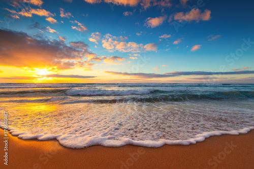 Beautiful sunrise over the sea and tropical island beach © ValentinValkov