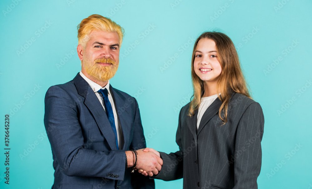 In fathers footsteps. Family business. Acceleration concept. Future generation replaces. Startup business. Man and little girl business founders. Management team. Father and daughter soulmates In fathers footsteps. Family business. Acceleration concept. Future generation replaces. Startup business. Man and little girl business founders. Management team. Father and daughter soulmates