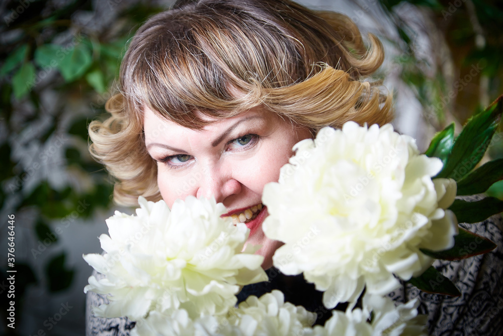 Portrait of beautiful plump chubby woman or girl in the room. Plus size model posing in studio during photoshoot. Portrait of beautiful plump chubby woman or girl in the room. Plus size model posing in studio during photoshoot.