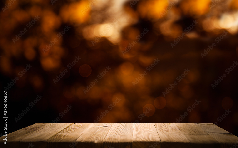 blurred background of bar and dark brown wooden desktop, place for a great product - obrazy, fototapety, plakaty 