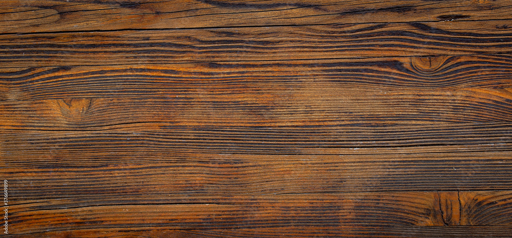 Naklejka premium texture of old brown wood plank. background of wooden surface