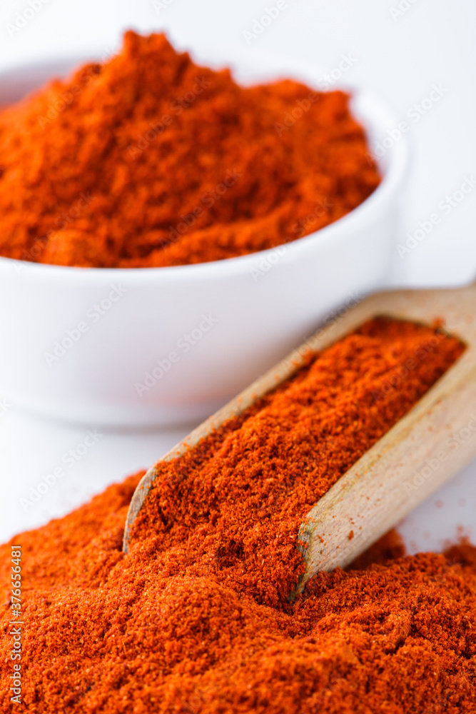 fragrant ground paprika on a white acrylic background
