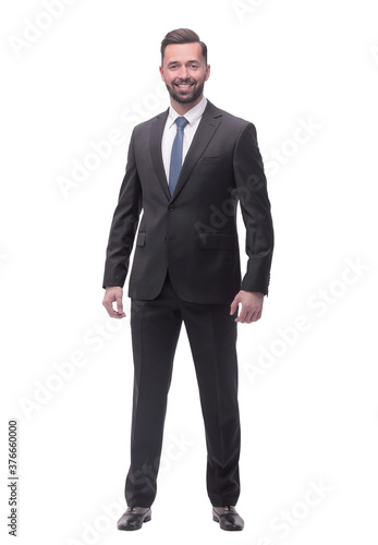 in full growth. smiling young businessman . isolated on white