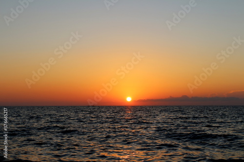 The sunset over the Tyrrhenian Sea on the coast of Tuscany