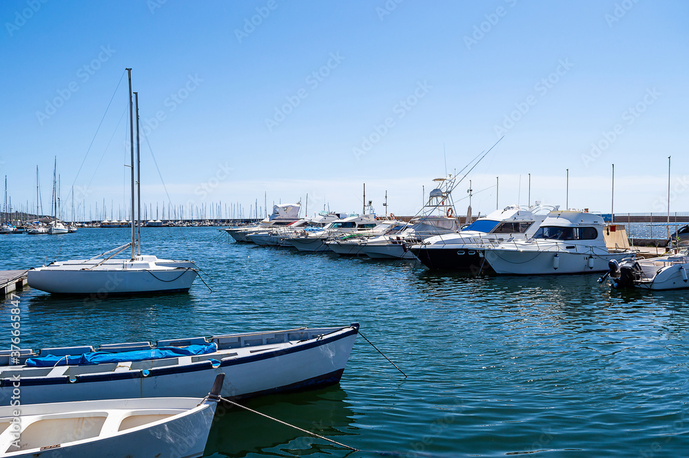fishing boats moored in a pier mediterranean sea dock fishing boats moored in a pier mediterranean sea dock