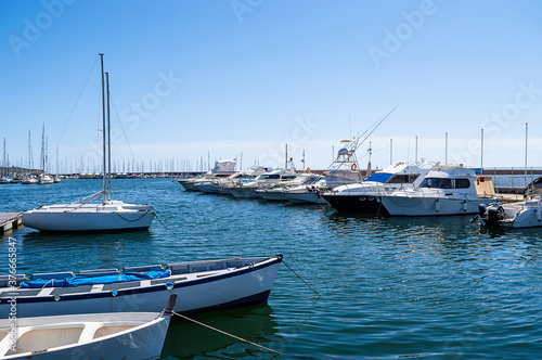fishing boats moored in a pier mediterranean sea dock