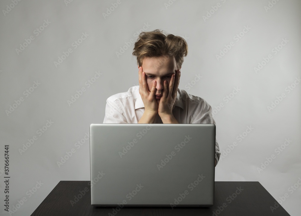 Frustrated and tired young man in white. Frustrated and tired young man in white.