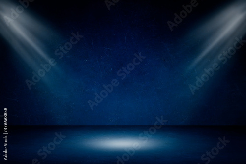 Empty space studio room of Blue plaster concrete grunge texture background with spotlight for use display product. © Angkana