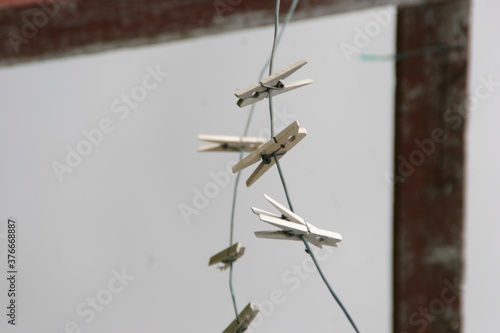 clothes pegs on a hanging line © CoppiBartali