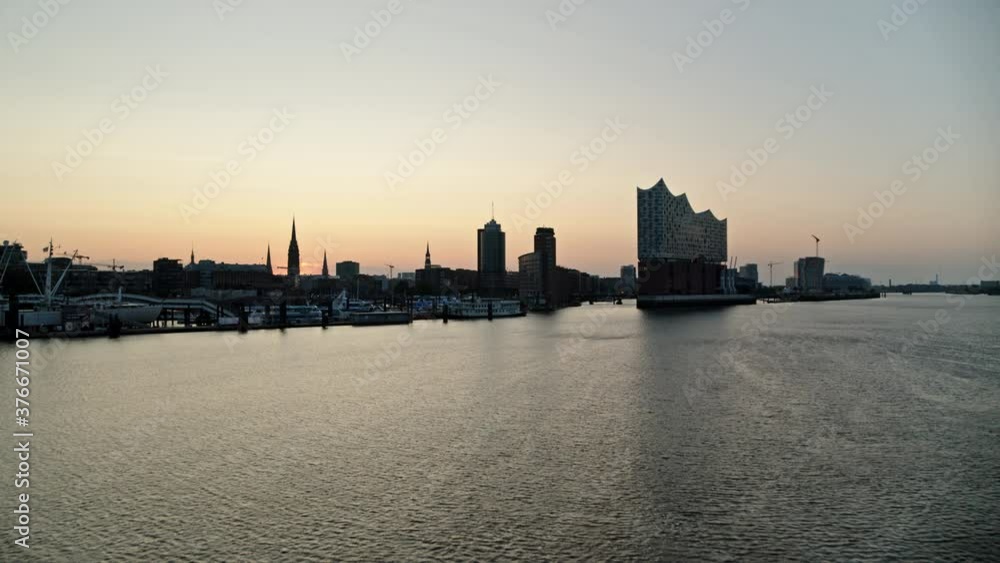 Port of Hamburg and Elbe Philharmonic Hall at sunset, Hamburg, Germany Port of Hamburg and Elbe Philharmonic Hall at sunset, Hamburg, Germany