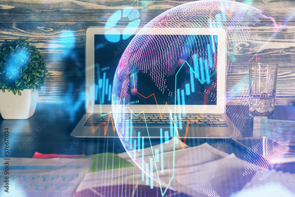 Double exposure of forex graph and work space with computer. Concept of international online trading.