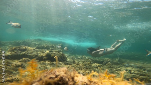 young woman snorkelling in costa brava © Egoitzainhoa