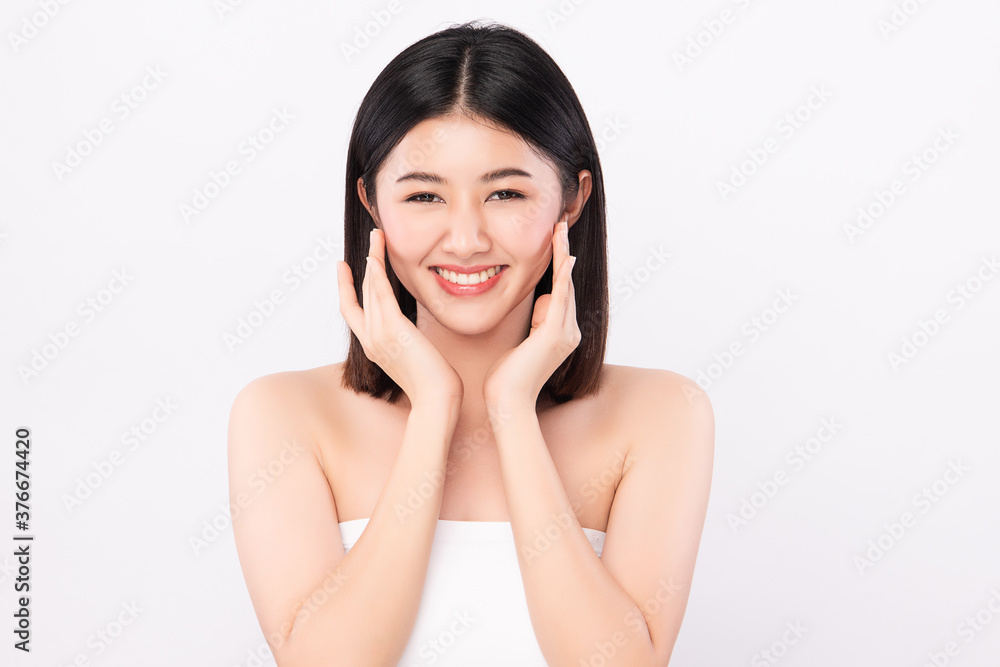 Beautiful Young asian Woman with Clean Fresh Skin on white background, Face care, Facial treatment, Cosmetology, beauty and spa, Asian women portrait Beautiful Young asian Woman with Clean Fresh Skin on white background, Face care, Facial treatment, Cosmetology, beauty and spa, Asian women portrait