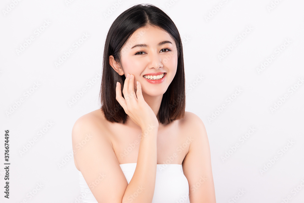 Beautiful Young asian Woman with Clean Fresh Skin on white background, Face care, Facial treatment, Cosmetology, beauty and spa, Asian women portrait Beautiful Young asian Woman with Clean Fresh Skin on white background, Face care, Facial treatment, Cosmetology, beauty and spa, Asian women portrait