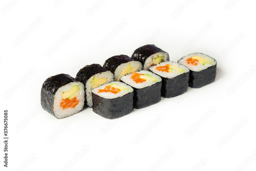 Sushi roll with salmon and avocado on a white plate, classic Japanese sushi. Traditional Japanese food with maki. Delicious pieces of sushi. For the restaurant menu. copyspace Sushi roll with salmon and avocado on a white plate, classic Japanese sushi. Traditional Japanese food with maki. Delicious pieces of sushi. For the restaurant menu. copyspace
