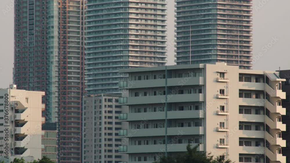 Modern Architectural Designs of Public Housing And High Rise Buildings In Tokyo, Japan. - slow zoom in shot Modern Architectural Designs of Public Housing And High Rise Buildings In Tokyo, Japan. - slow zoom in shot