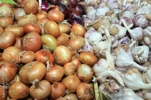 Fototapeta Naklejka Na Ścianę i Meble -  Full frame photo of white onion and garlic bulbs.