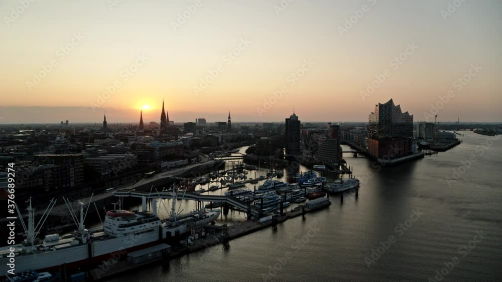 Port of Hamburg and Elbe Philharmonic Hall at sunset, Hamburg, Germany Port of Hamburg and Elbe Philharmonic Hall at sunset, Hamburg, Germany