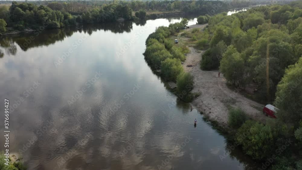 Aerial view. Untouched nature near the Desna river. A river among untouched nature. River among fields and forests. Trees by the river. Aerial view. Untouched nature near the Desna river. A river among untouched nature. River among fields and forests. Trees by the river.