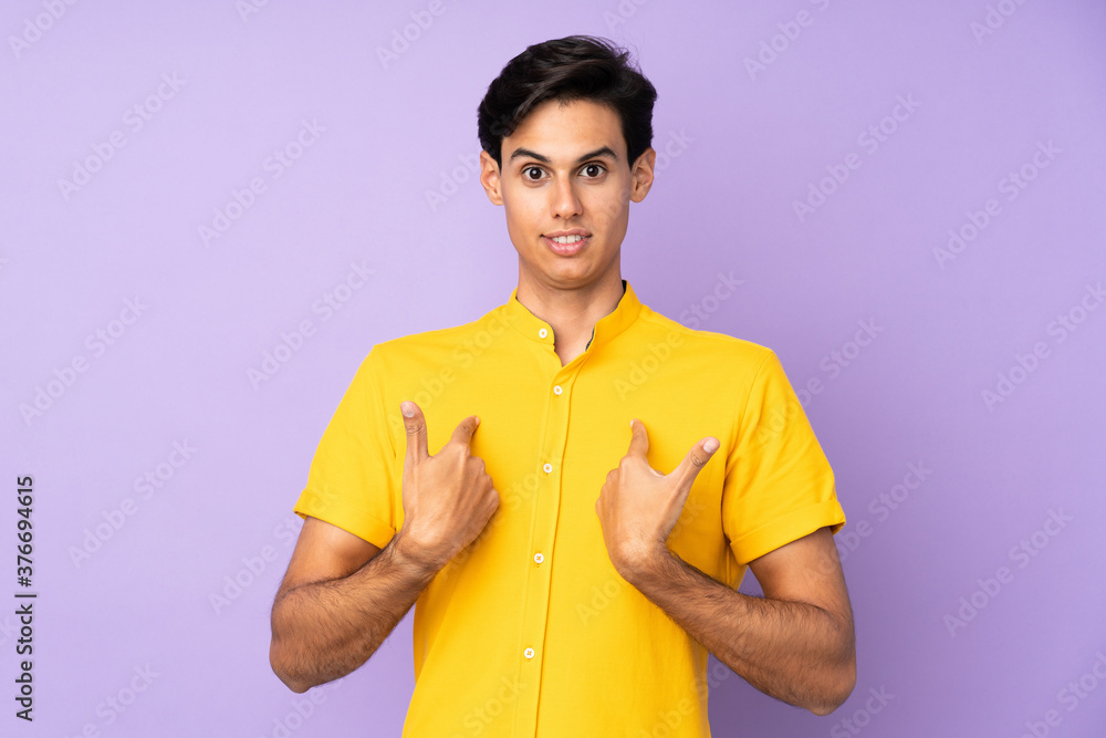 Man over isolated purple background with surprise facial expression Man over isolated purple background with surprise facial expression