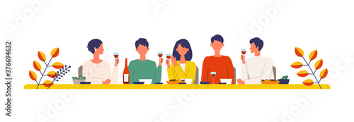 Vector illustration of people eating dinner together in the autumn. People enjoy drinking wine.