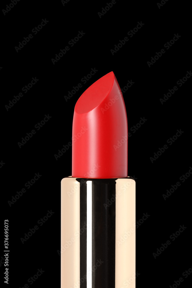 red lipstick isolated on black background with copy space for your text red lipstick isolated on black background with copy space for your text