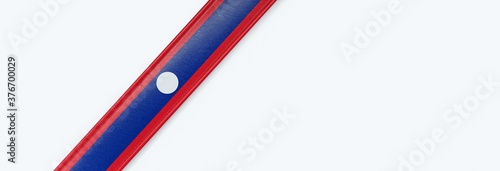 Leather strip with the flag of Laos. photo