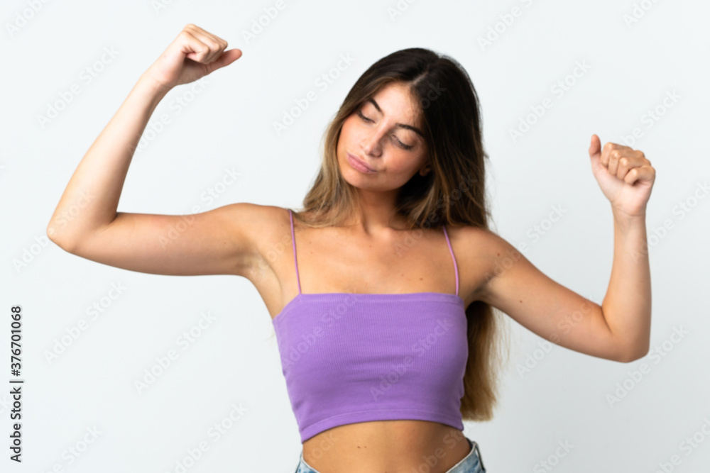 Young caucasian woman isolated on white background doing strong gesture Young caucasian woman isolated on white background doing strong gesture