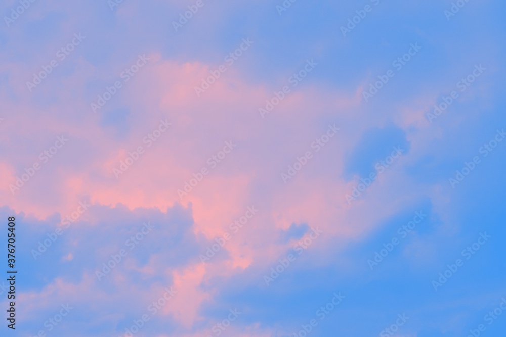 Abstract pink and blue watercolor blurred sky background