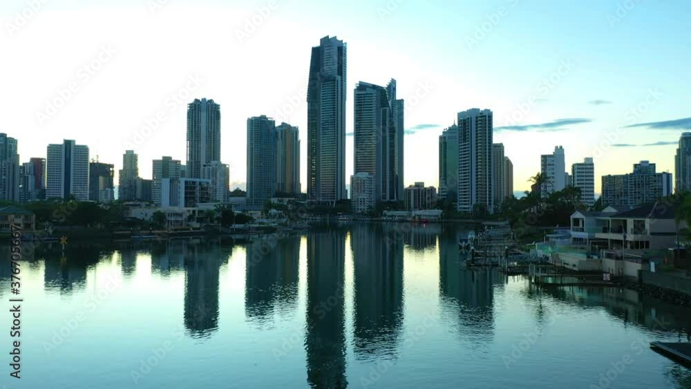 Flying over still canal waters to reveal spectacular sunrise, Surfers Paradise Flying over still canal waters to reveal spectacular sunrise, Surfers Paradise