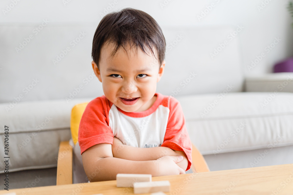 Angry kid.Little asian boy looking at his mother and fighting with mom.Furious hungry toddler kid got upset and sad and he has a negative attitude.Depressed little toddler boy complaining.Ef in Kid. Angry kid.Little asian boy looking at his mother and fighting with mom.Furious hungry toddler kid got upset and sad and he has a negative attitude.Depressed little toddler boy complaining.Ef in Kid.