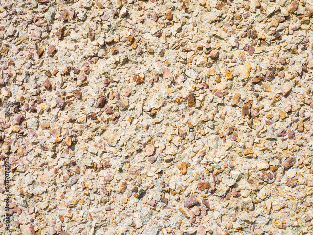 Concrete wall background with stones Concrete wall background with stones