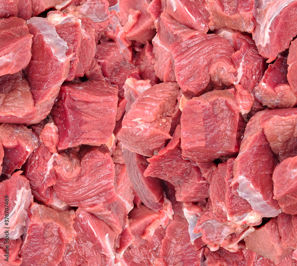 Pieces of raw beef background