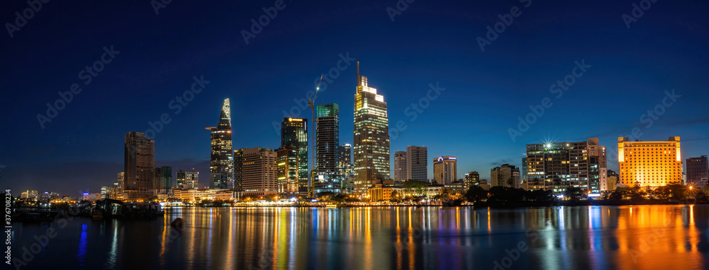 Bitexco Financial Tower building, buildings, roads, Thu Thiem 2 bridge and Saigon river in Ho Chi Minh city - This city is a popular tourist destination of Vietnam.