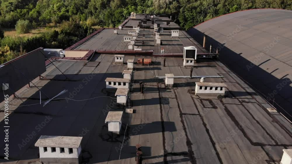 Arial view on the historic mining town Nikiszowiec , chimneys on roof Arial view on the historic mining town Nikiszowiec , chimneys on roof