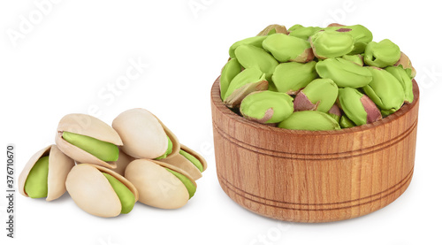 peeled pistachio in wooden bowl isolated on white background with clipping path and full depth of field