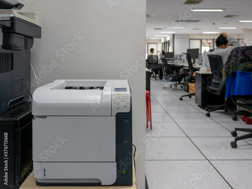 Принти на полотні multifunction laser printer in office