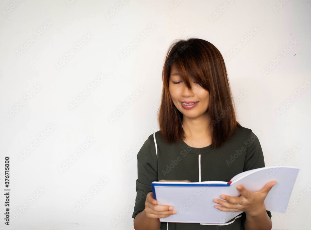 Woman reading book with happy feeling Woman reading book with happy feeling