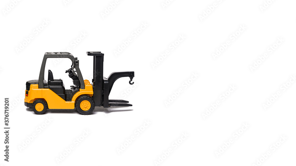 toy forklift close up isolated on white, copy space toy forklift close up isolated on white, copy space