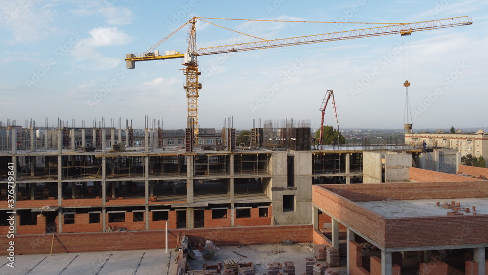 Fototapeta premium construction site with a crane.construction of a multi-storey building