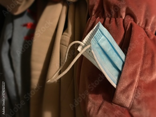 autumn wardrobe. 
medical mask in pocket.