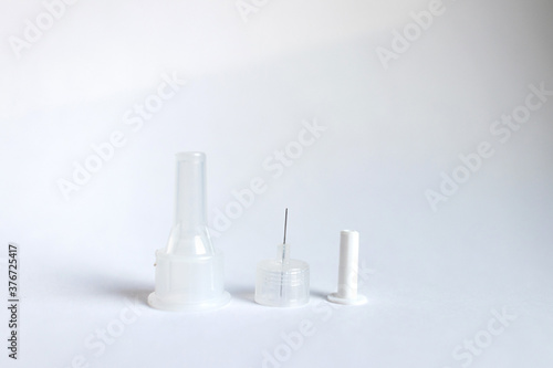Insulin pen needles isolated on white background . Diabetes concept. Insulin injection needle 3.5 mm.