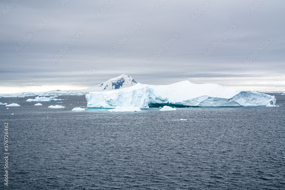 Antarctica, Peninsula, icebergs floating between Detail Island and Lemaire Channel.
