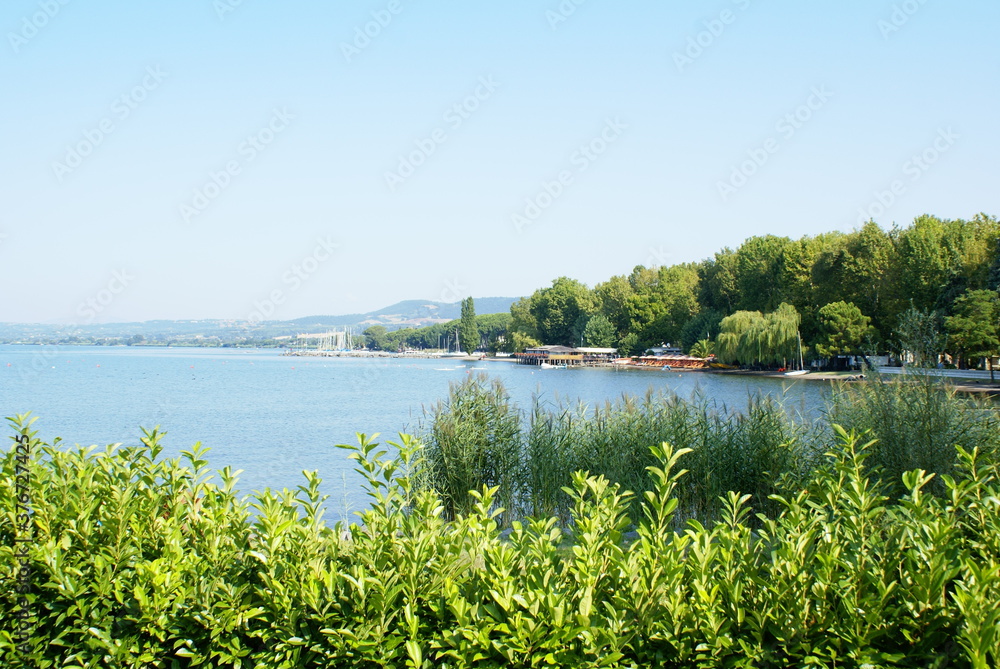 Panoramic view of the Lake of Bolsena (Lazio, Italy) in a Summer day Panoramic view of the Lake of Bolsena (Lazio, Italy) in a Summer day