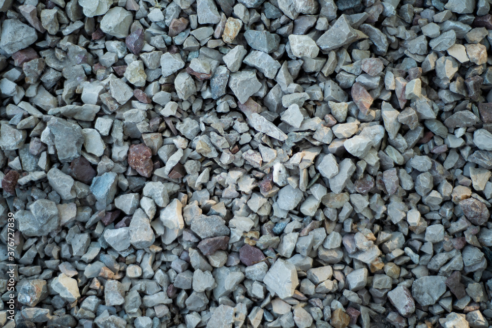 pattern with black stones on the ground pattern with black stones on the ground